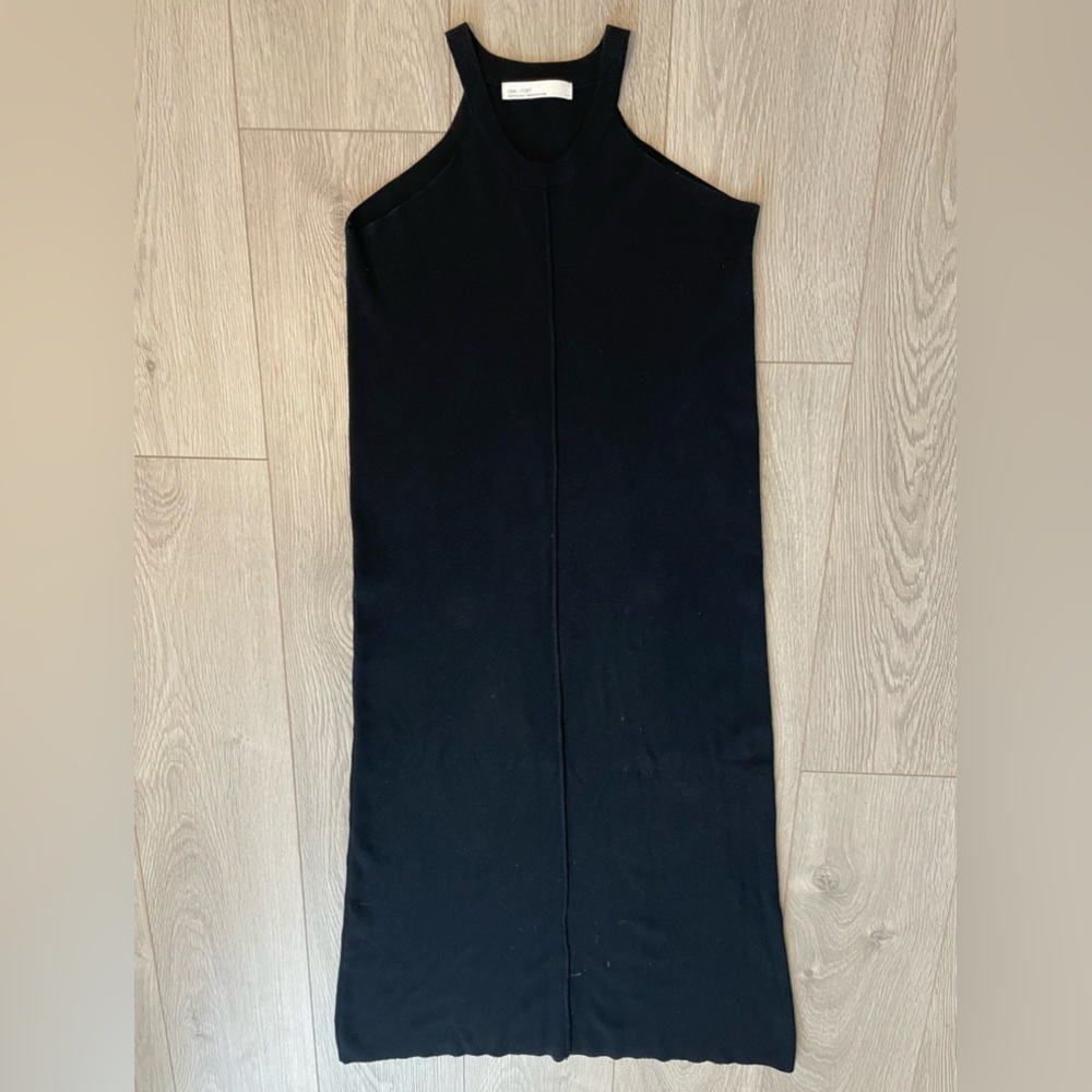 Mid-length, light-knit, flattering neckline